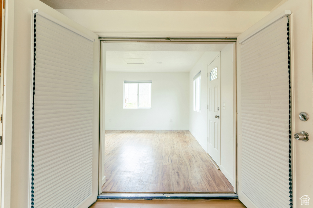 Hall with wood finished floors