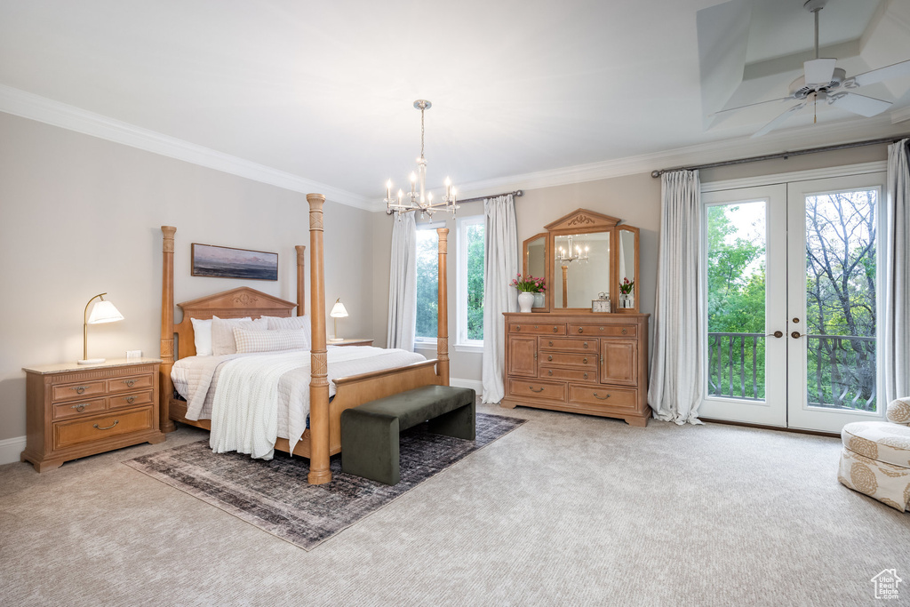 Bedroom featuring ornamental molding, light carpet, a chandelier, and access to exterior