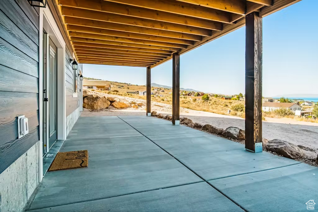 View of patio / terrace with a mountain view