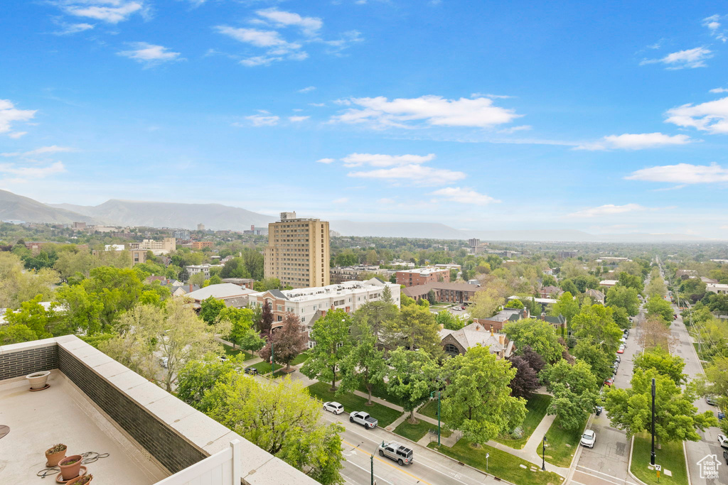 Birds eye view of property featuring a city view and a mountain view