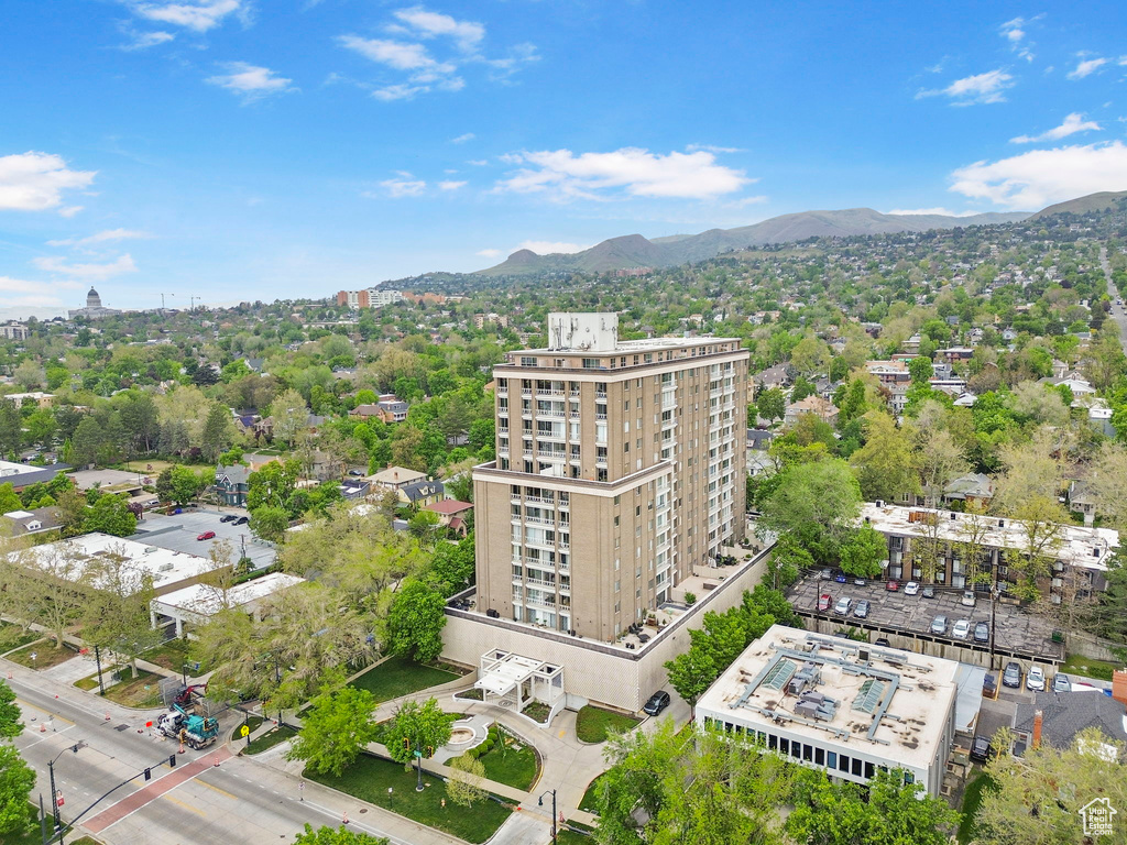 Birds eye view of property with a mountain view