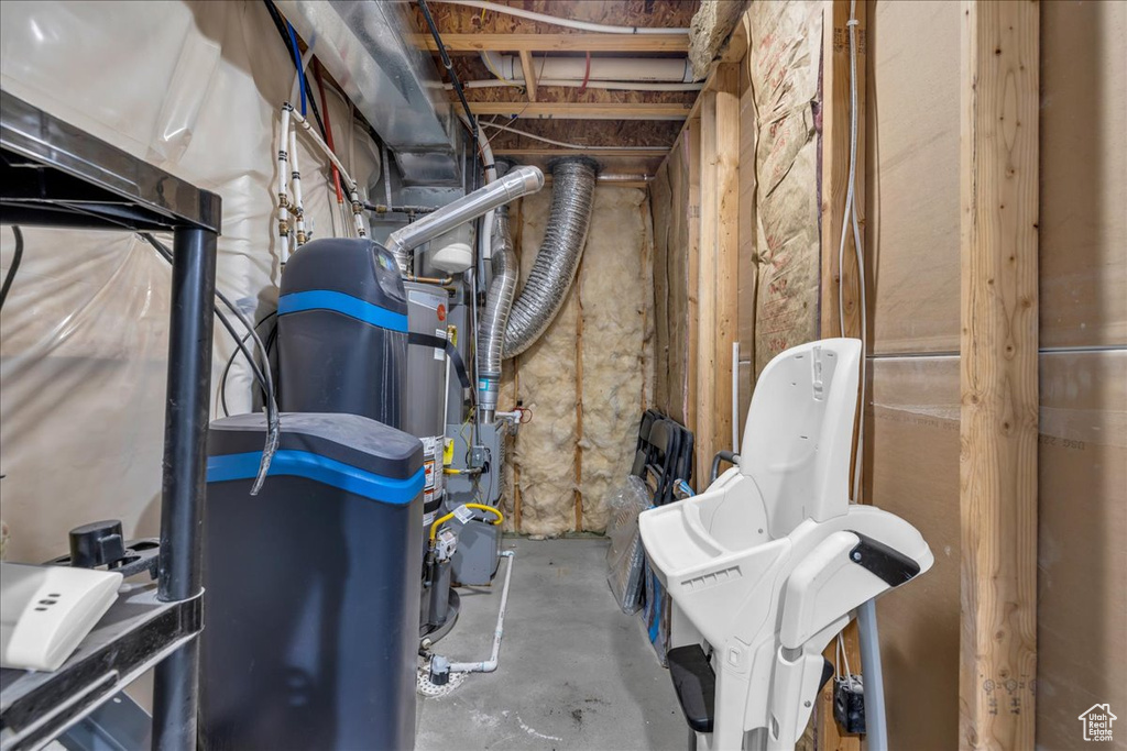 Interior space with strapped water heater