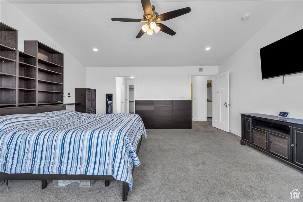 Bedroom featuring a ceiling fan, carpet flooring, recessed lighting, and vaulted ceiling