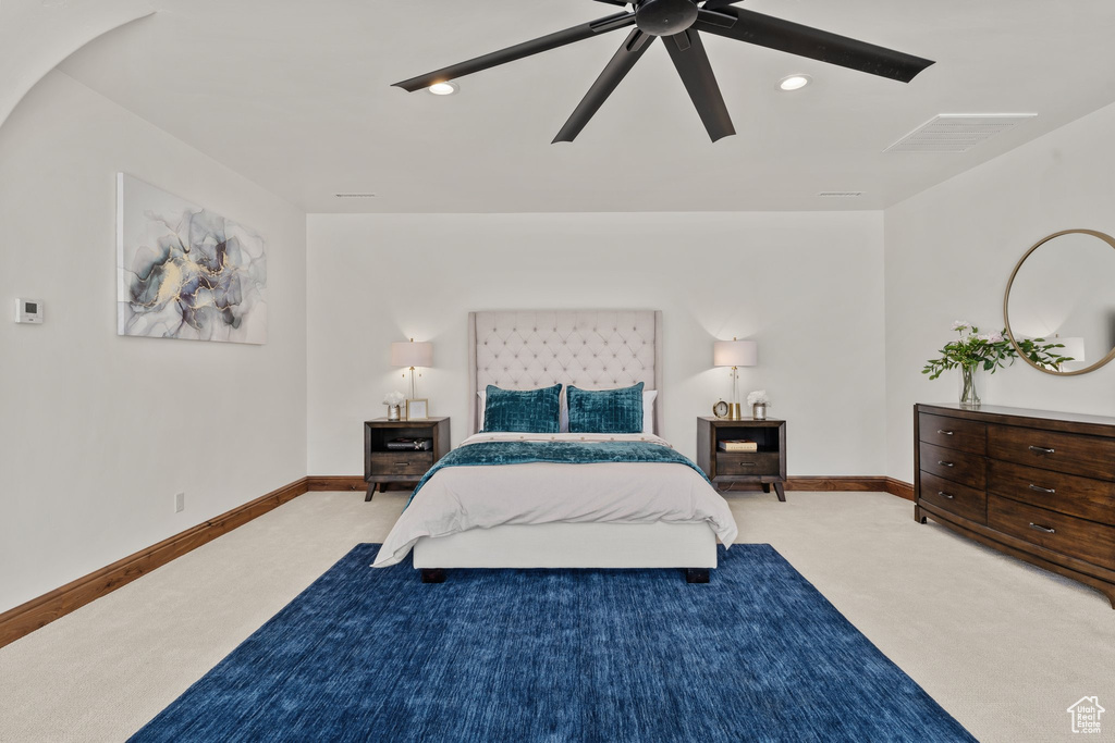 Bedroom featuring carpet, visible vents, ceiling fan, and baseboards