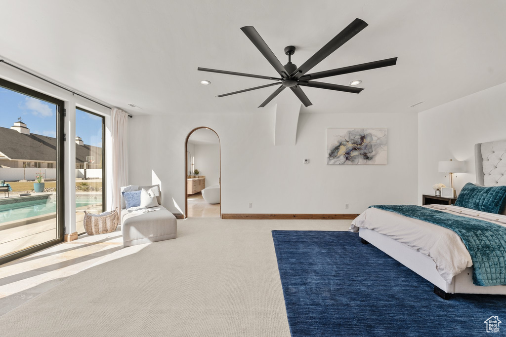 Carpeted bedroom with access to outside, baseboards, a ceiling fan, and recessed lighting