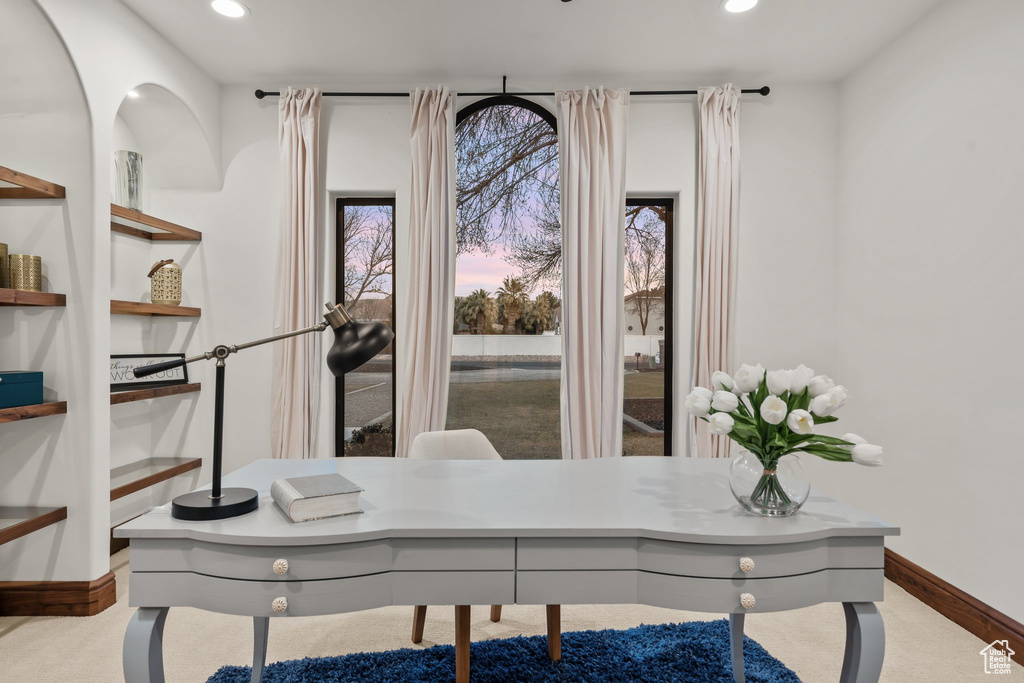 Office area featuring baseboards and recessed lighting