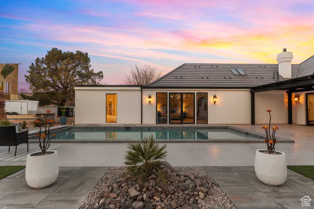 Outdoor pool with a patio area