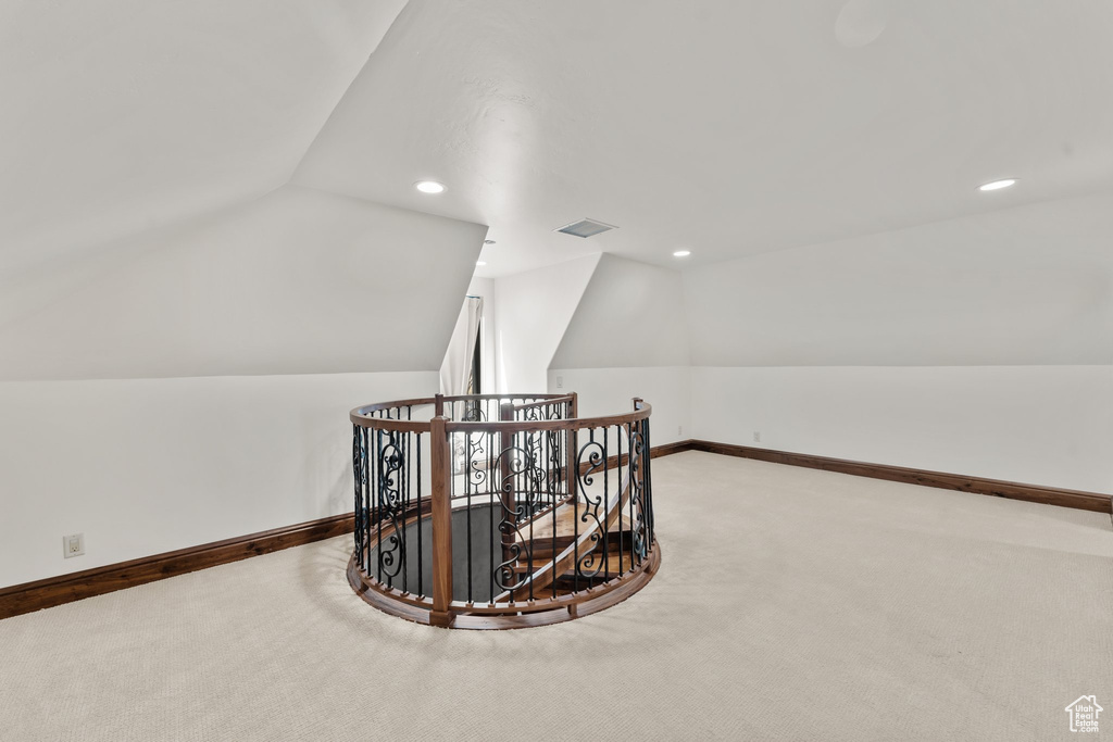 Bonus room with carpet floors, recessed lighting, visible vents, vaulted ceiling, and baseboards