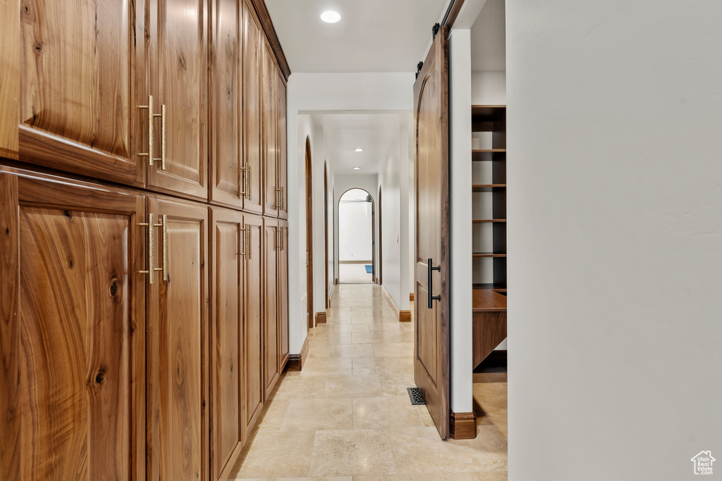 Hallway with a barn door