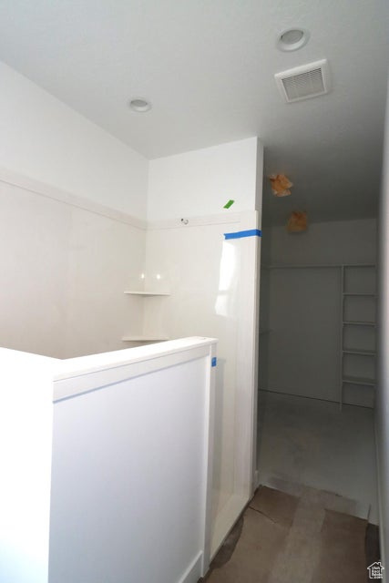 Bathroom featuring visible vents and recessed lighting