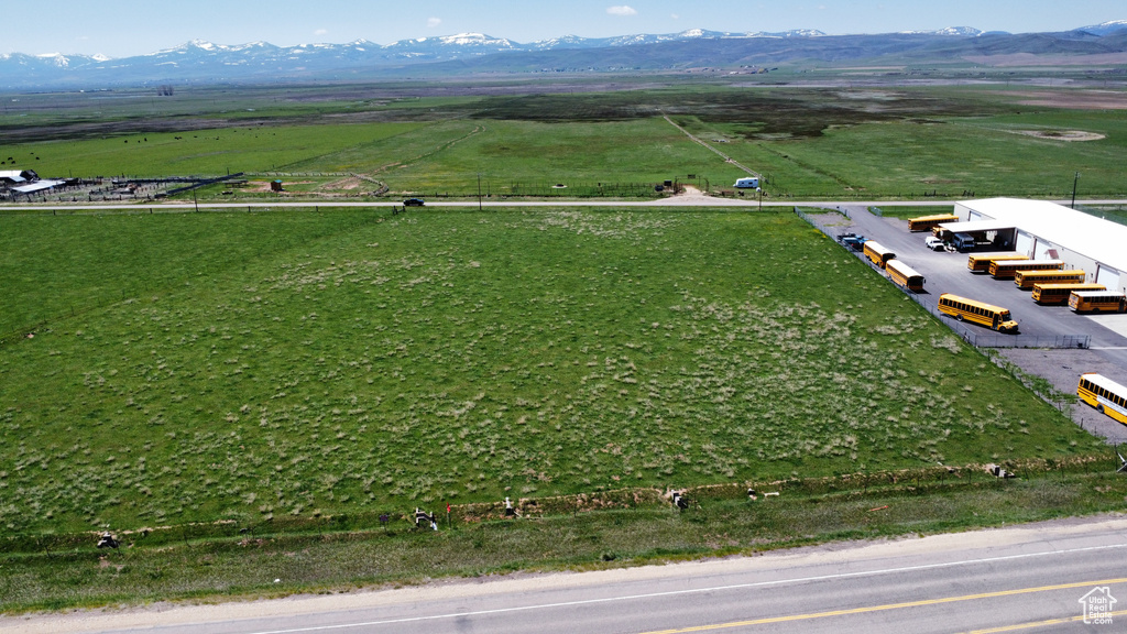 Aerial view of sparsely populated area featuring a mountain backdrop