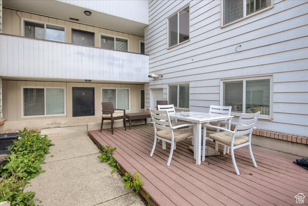 Wooden deck with outdoor dining area