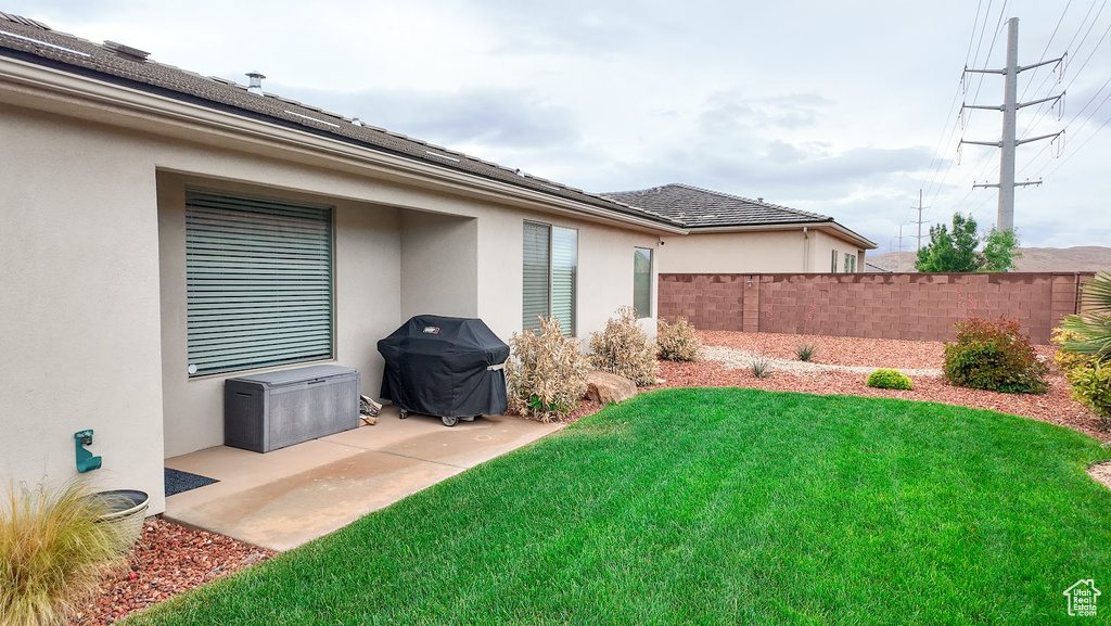 View of yard with fence