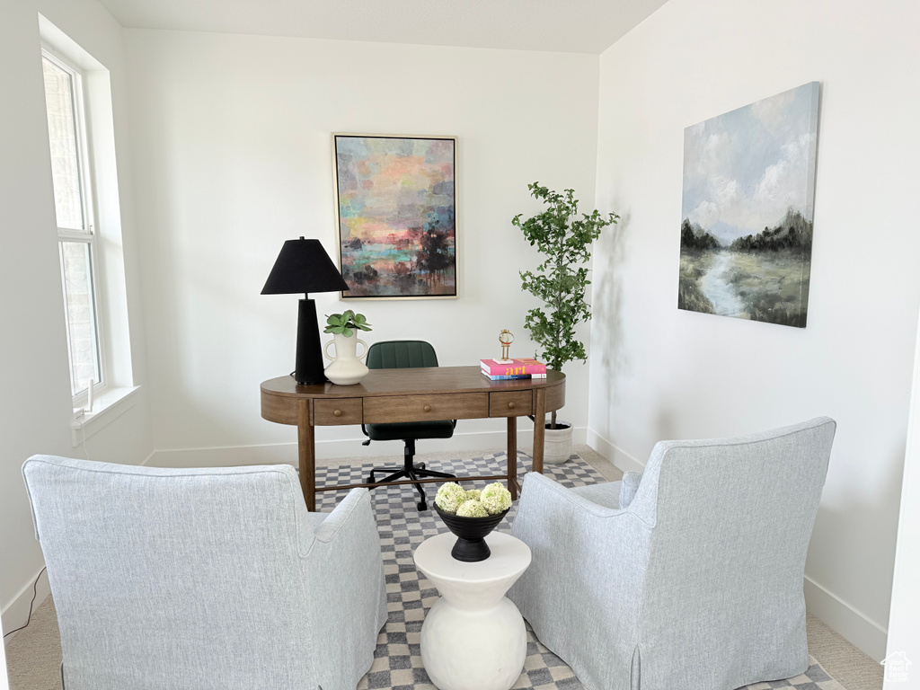 Home office featuring baseboards