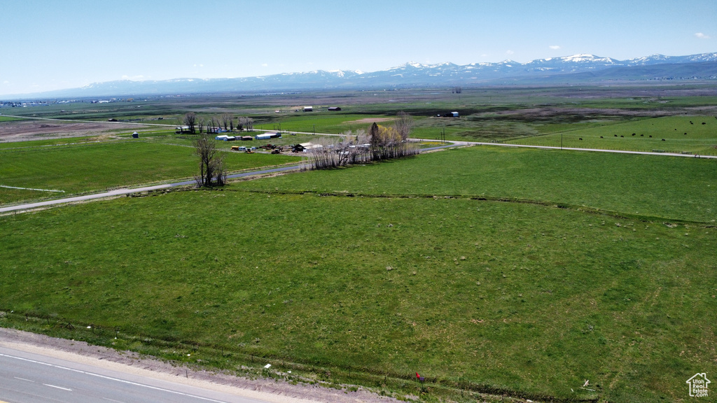 Aerial view of sparsely populated area with a mountainous background