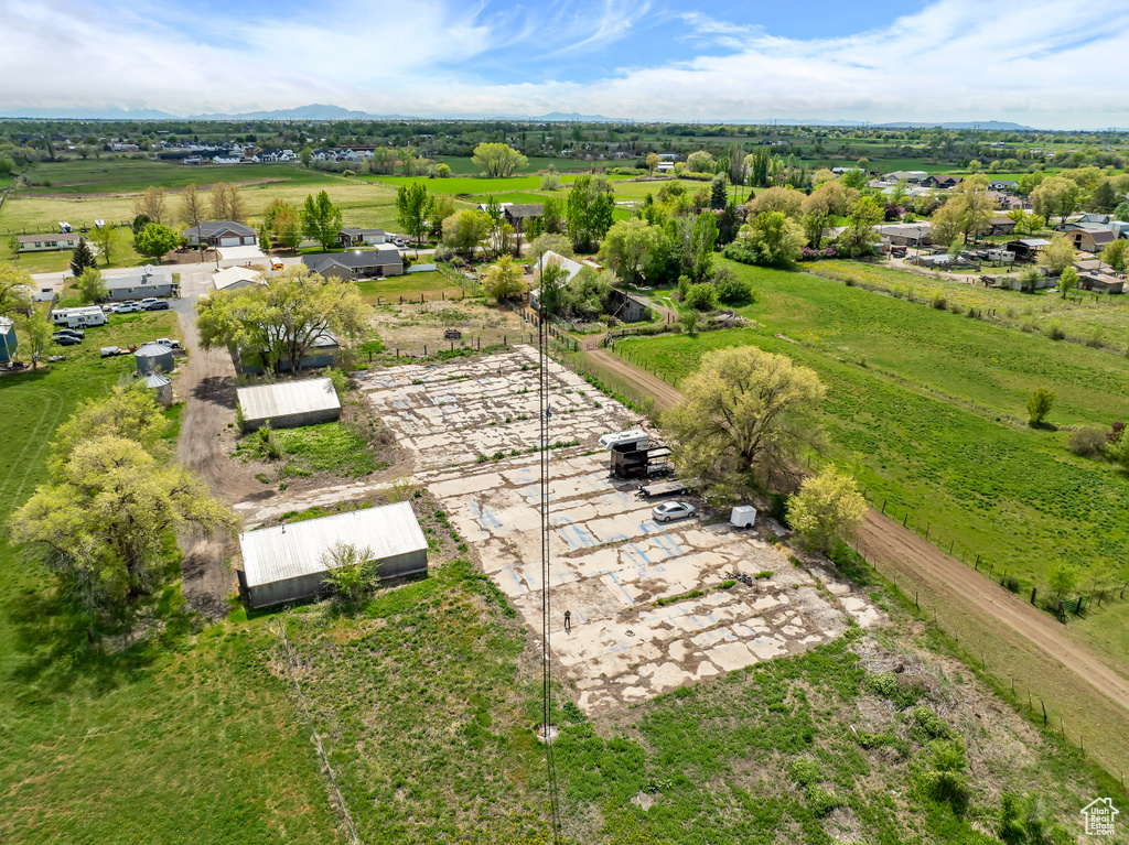Aerial view featuring a rural view and a mountain view