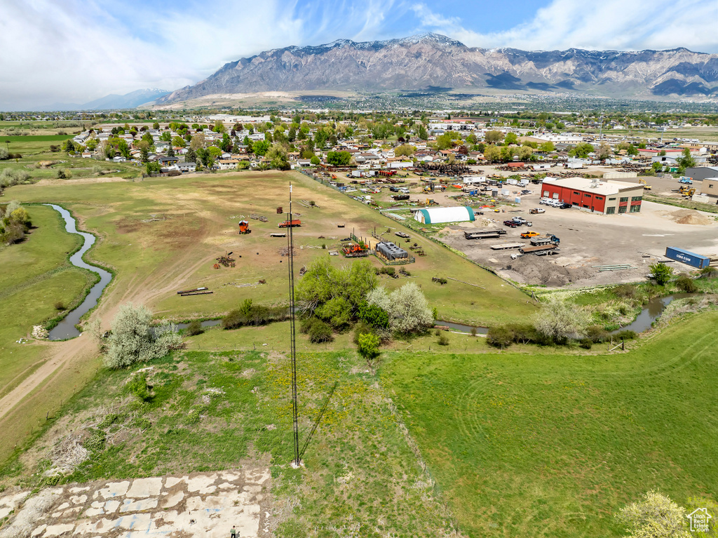 Bird\'s eye view with a water and mountain view