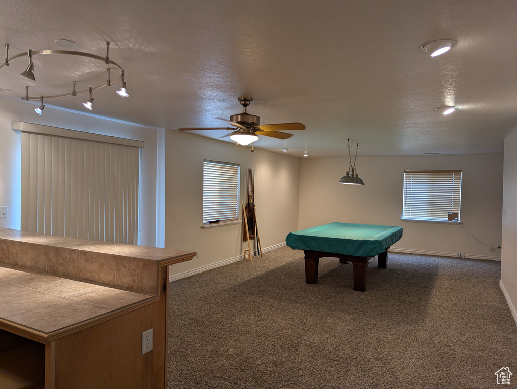 Rec room featuring carpet, baseboards, a ceiling fan, and billiards