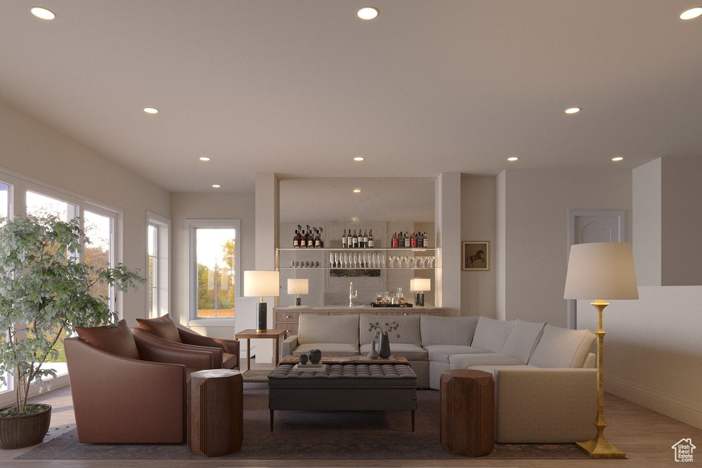 Living room with a bar and recessed lighting