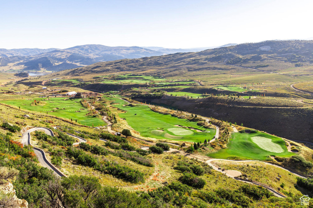 Birds eye view of property featuring a mountain view and view of golf course