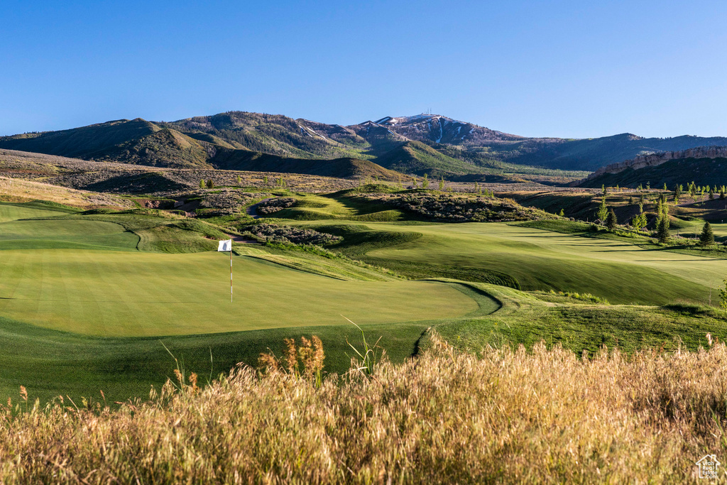 View of property's community with a mountain view and golf course view