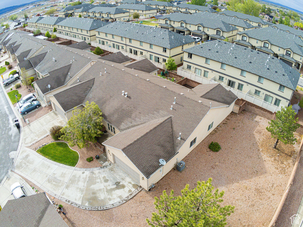 Birds eye view of property with a residential view