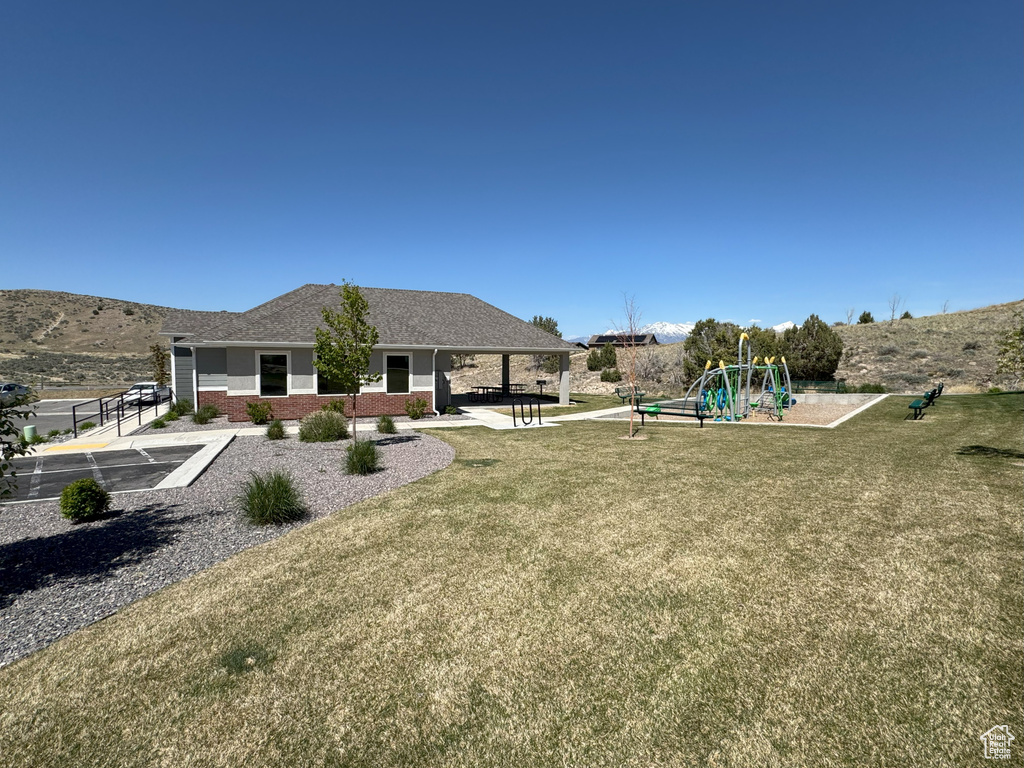 View of yard featuring playground community