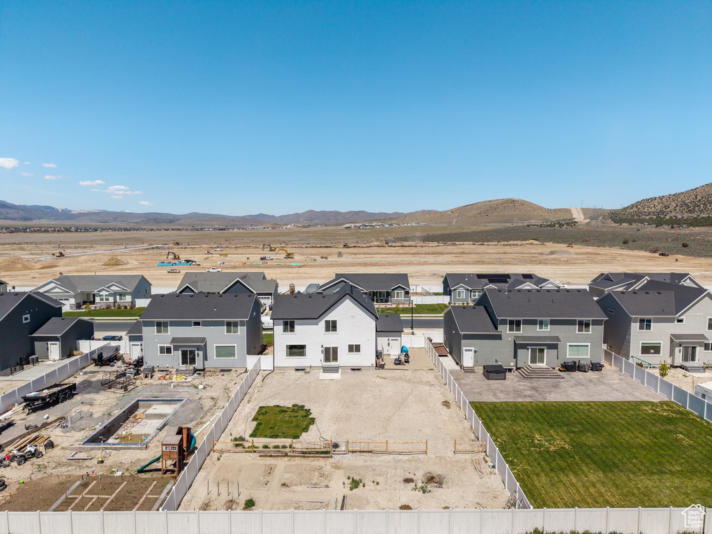 Aerial view featuring a mountain view and a residential view