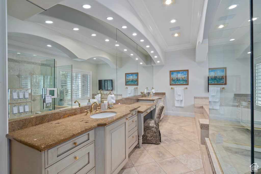 Bathroom with visible vents, baseboards, vanity, ornamental molding, and recessed lighting