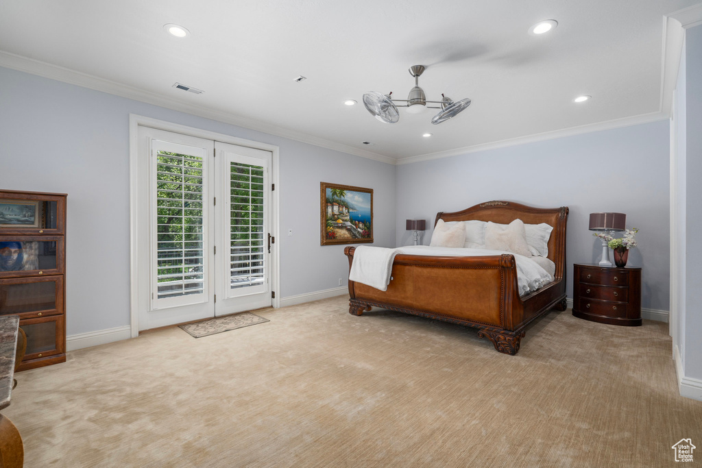 Bedroom featuring carpet flooring, access to outside, and baseboards