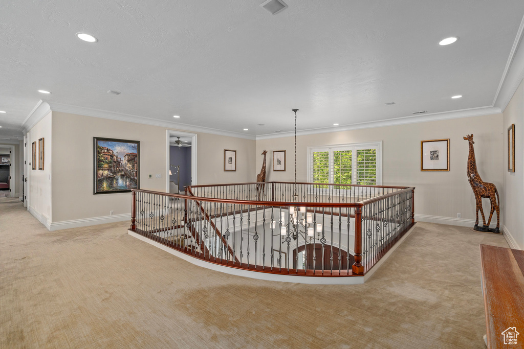 Hall featuring baseboards, an upstairs landing, recessed lighting, and carpet