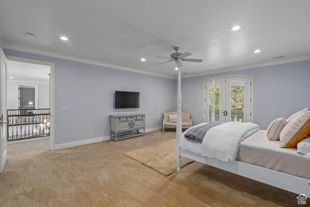 Bedroom with access to outside, french doors, ornamental molding, and recessed lighting