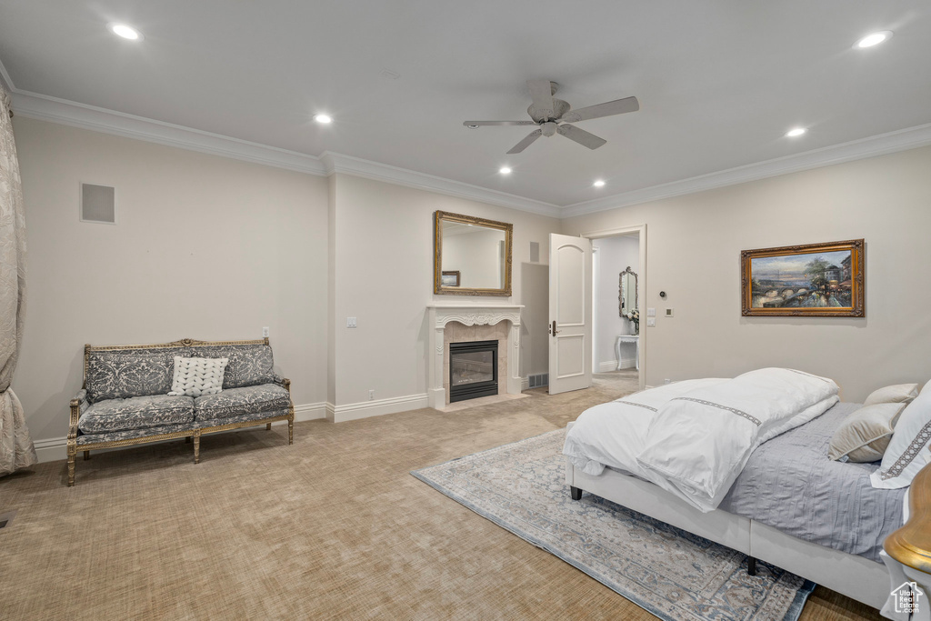 Bedroom featuring light colored carpet, crown molding, and recessed lighting