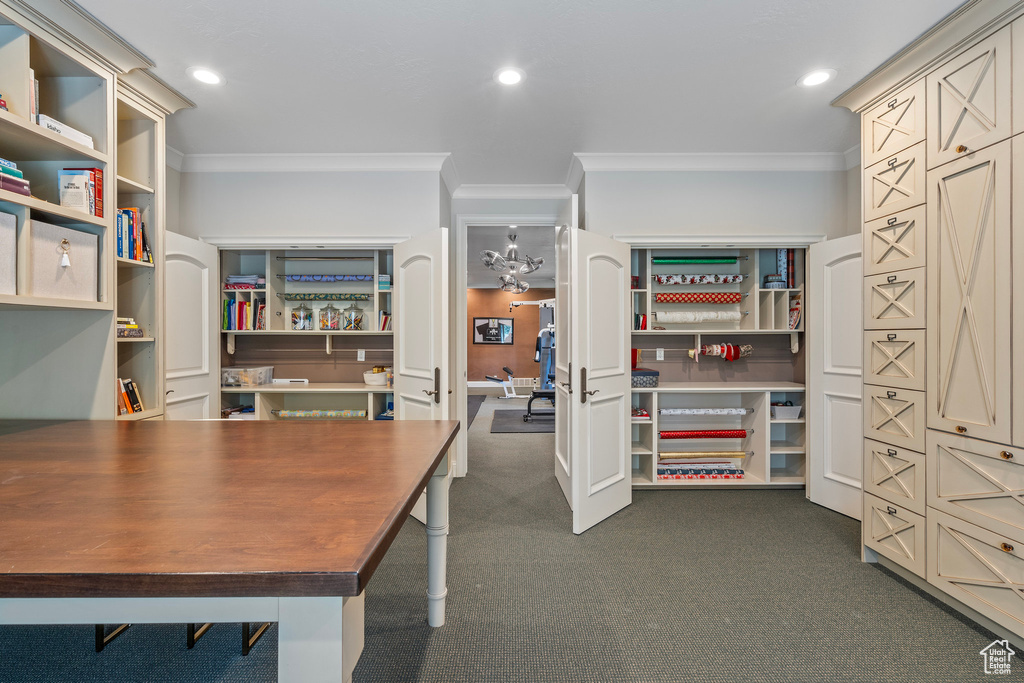 Office featuring dark colored carpet, ornamental molding, and recessed lighting