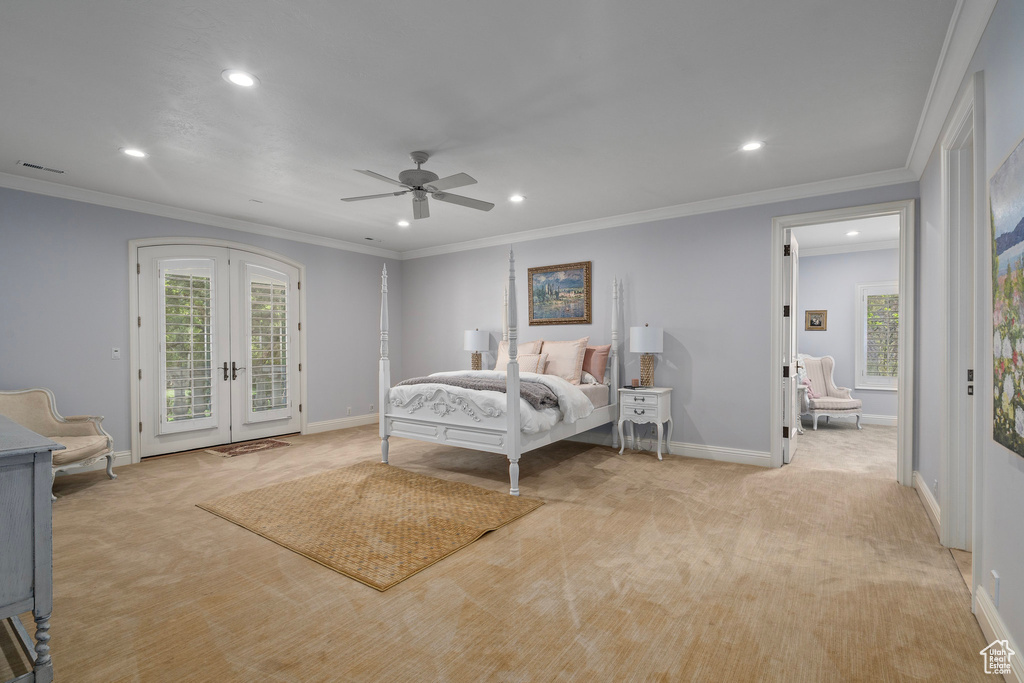 Bedroom with french doors, baseboards, light colored carpet, access to outside, and recessed lighting