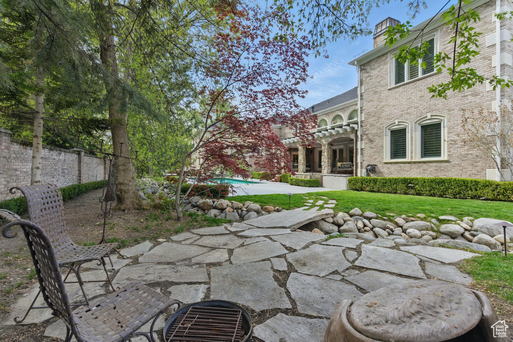 View of patio / terrace featuring an outdoor pool