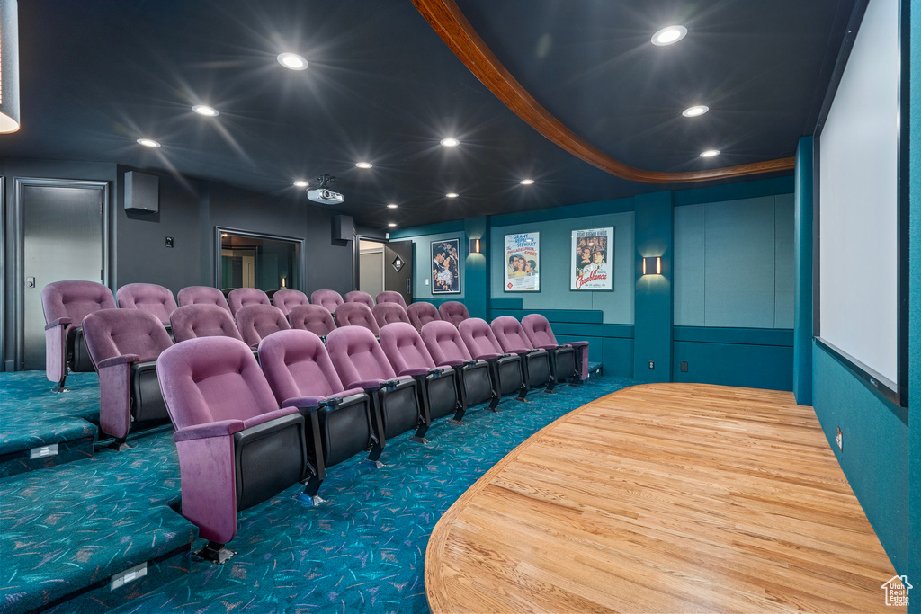 Cinema room with carpet flooring and recessed lighting