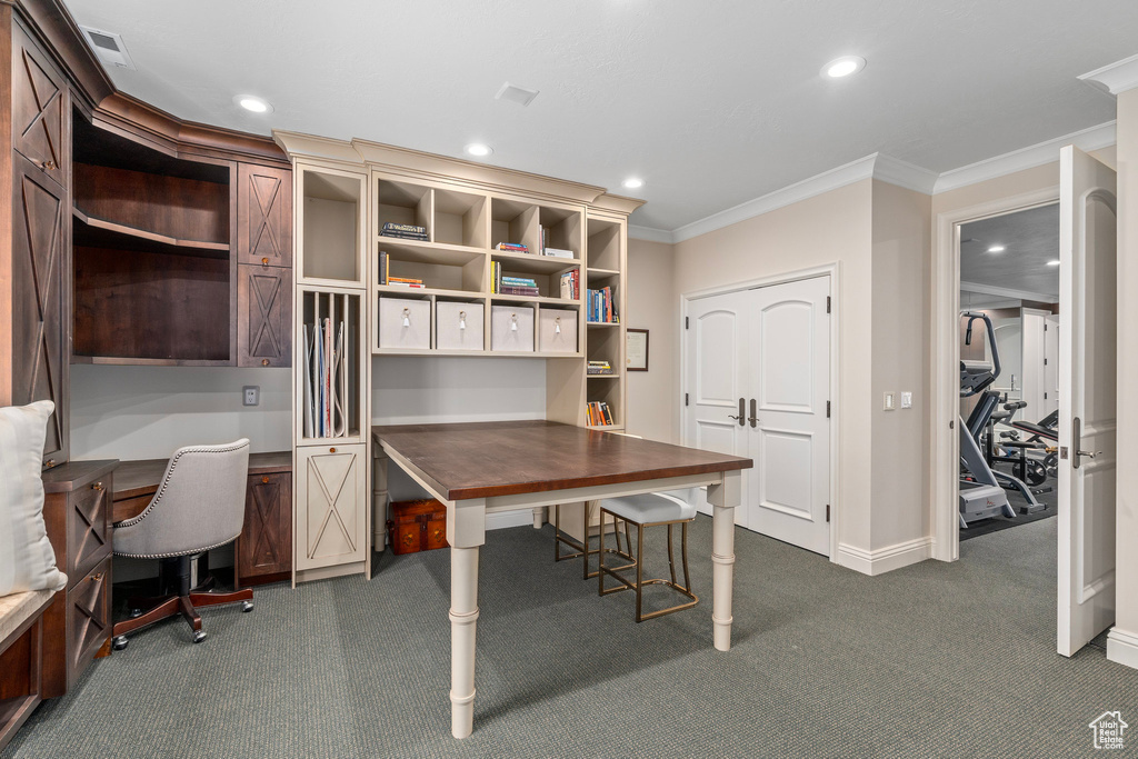 Office featuring ornamental molding, visible vents, recessed lighting, dark colored carpet, and baseboards