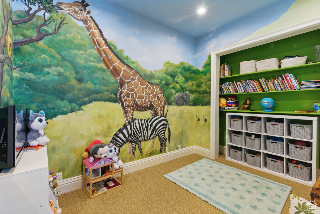 Playroom featuring carpet