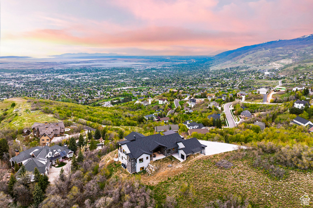 Aerial view at dusk with a mountain view and a residential view