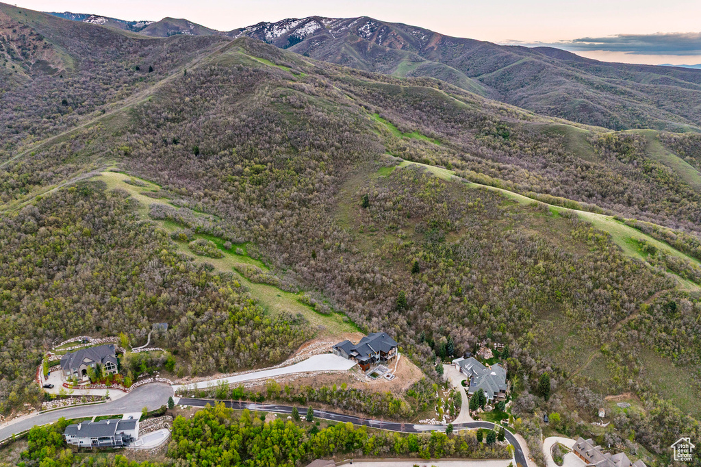Aerial view at dusk featuring a mountain view