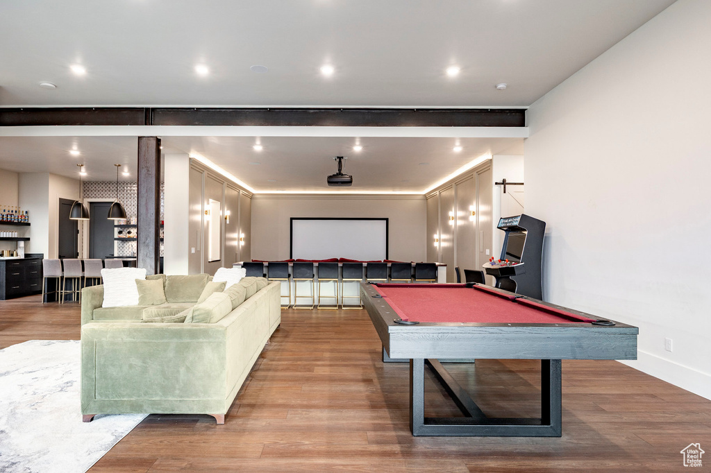 Playroom featuring billiards, wood finished floors, and baseboards