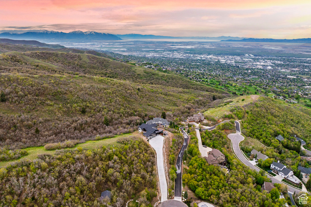 Aerial view at dusk featuring a mountain view