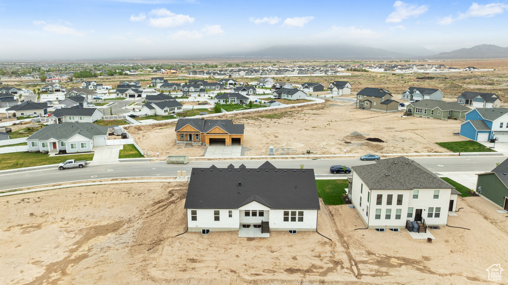Aerial view featuring a mountain view and a residential view