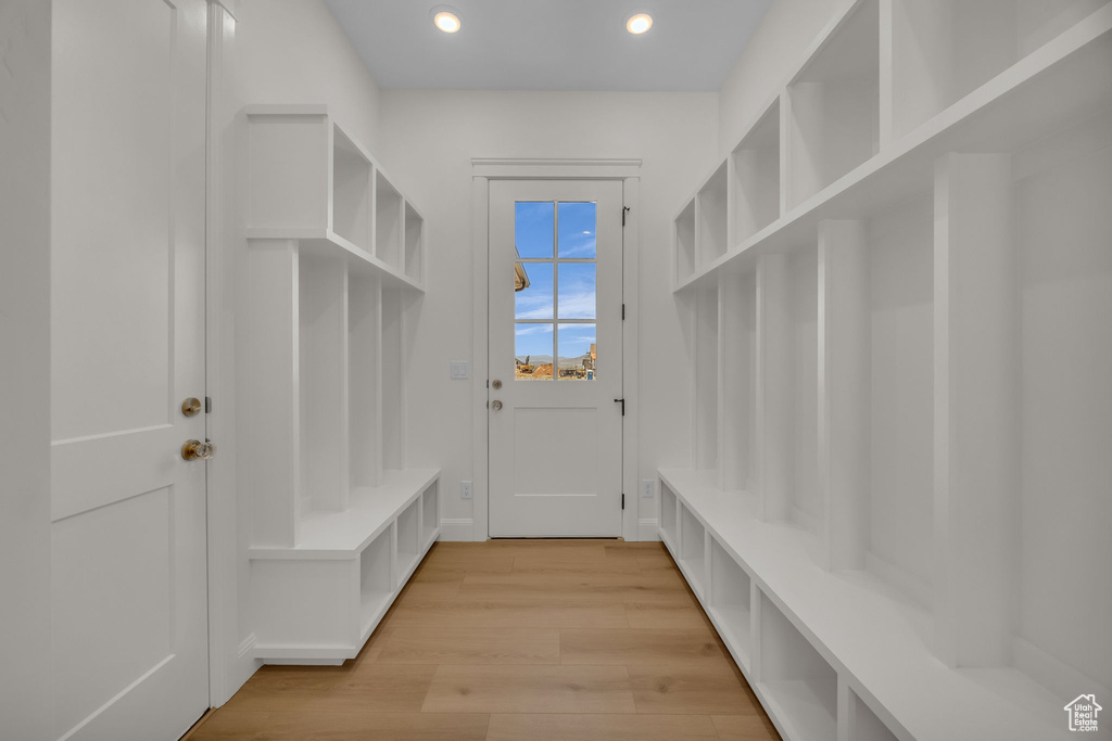 Mudroom with light wood-style floors and recessed lighting