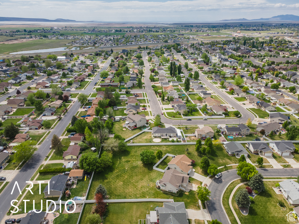 Bird\'s eye view with a water and mountain view and a residential view