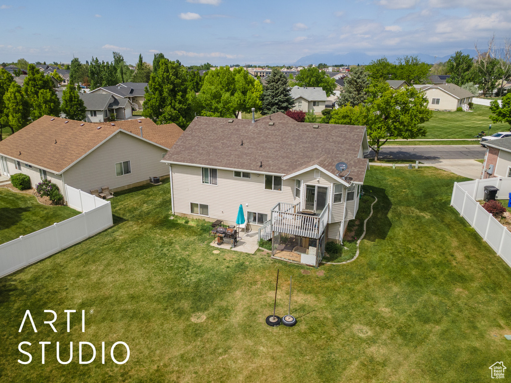 Birds eye view of property with a residential view