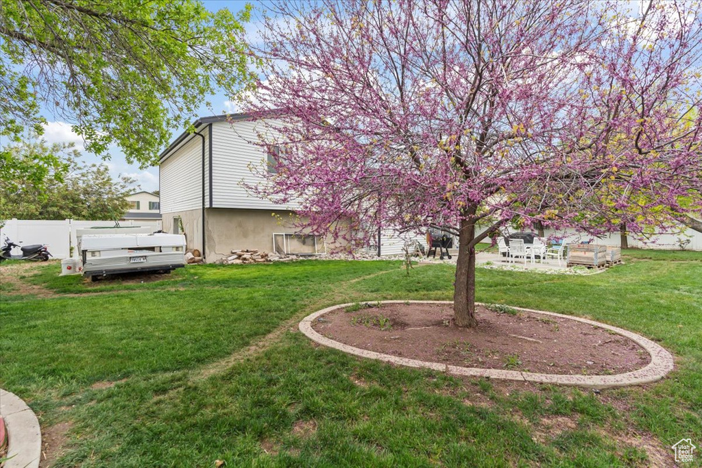 View of yard with fence