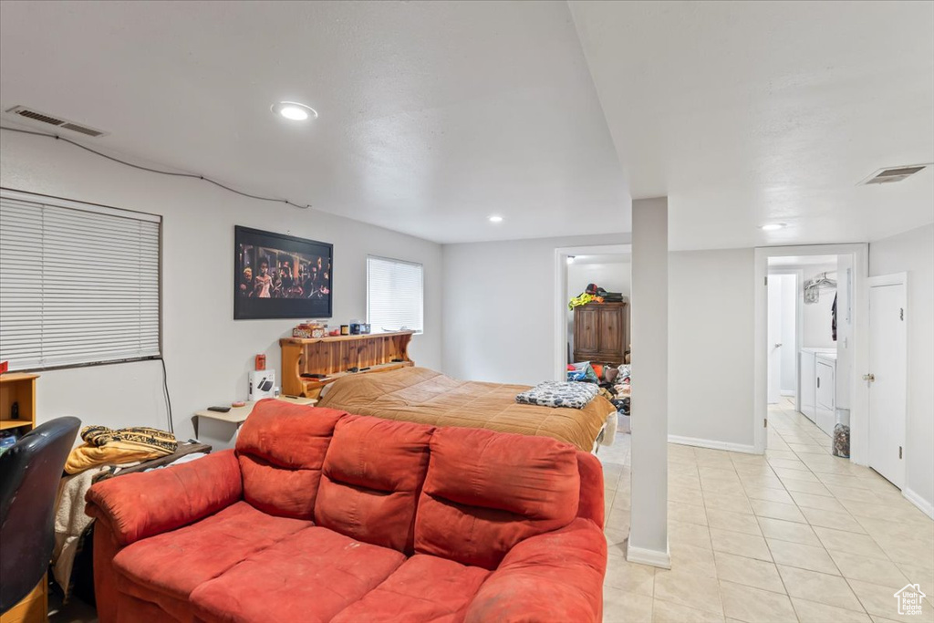 Bedroom with baseboards, light tile patterned floors, visible vents, and recessed lighting