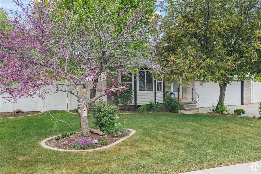 Exterior space featuring driveway and a garage